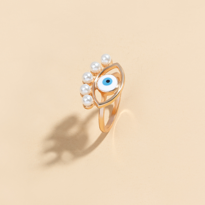 retro pearl inlaid eye alloy ring wholesale