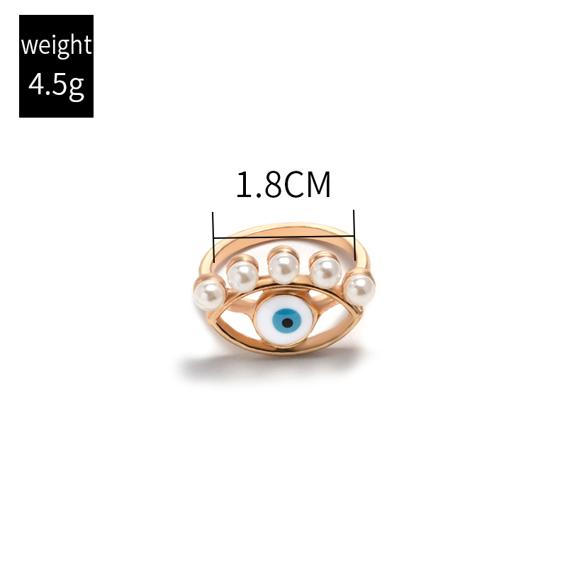 retro pearl inlaid eye alloy ring wholesale