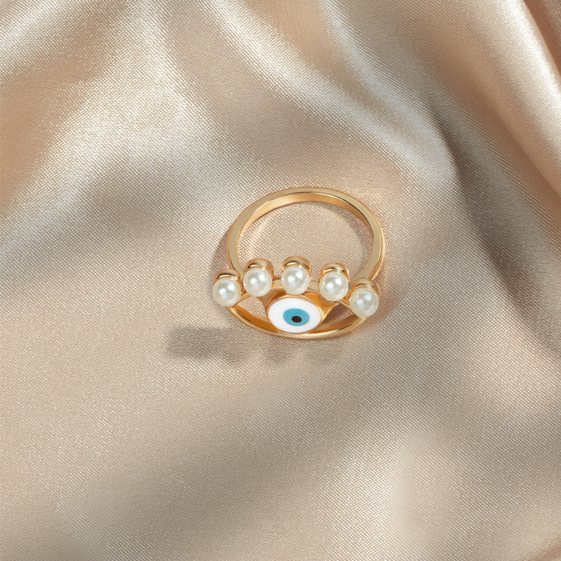 retro pearl inlaid eye alloy ring wholesale