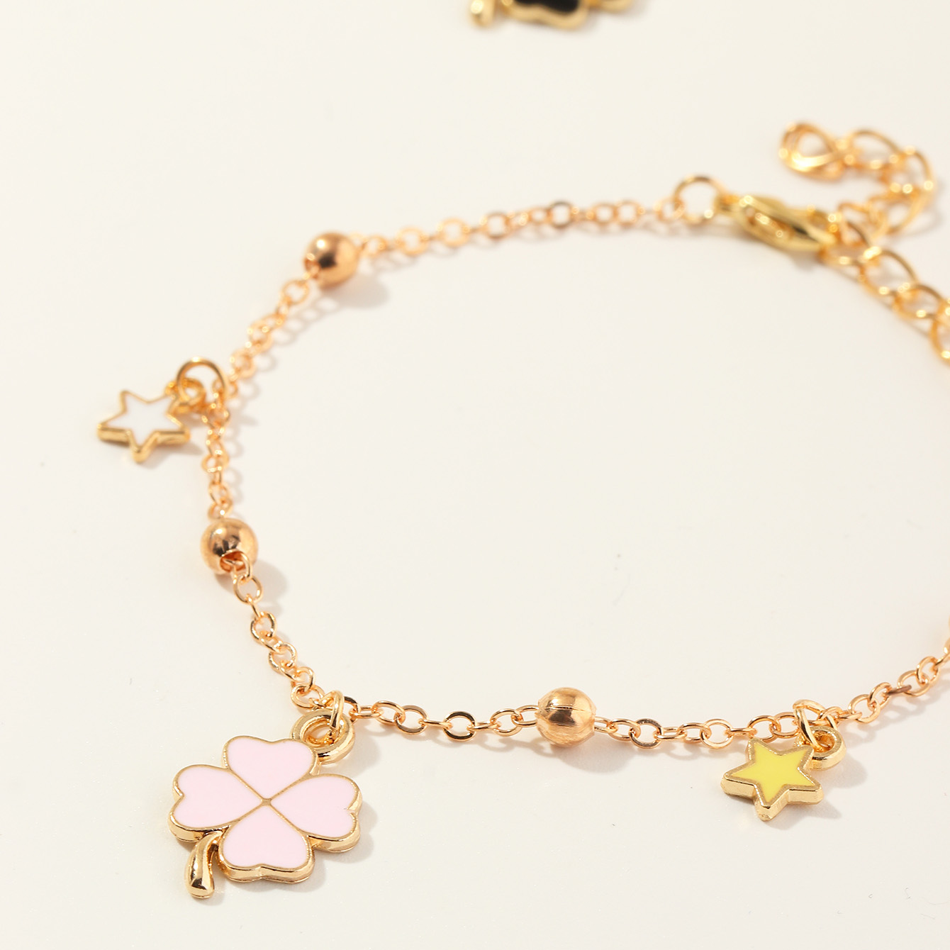 Simple four-leaf metal bracelet set