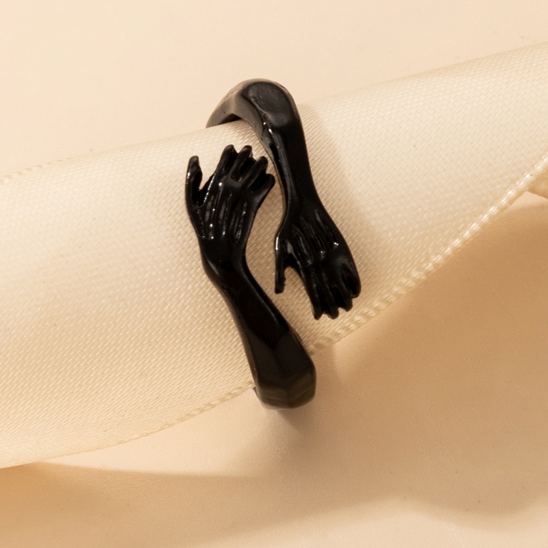 Nihaojewelry wholesale jewelry new simple black hands embracing shape ring