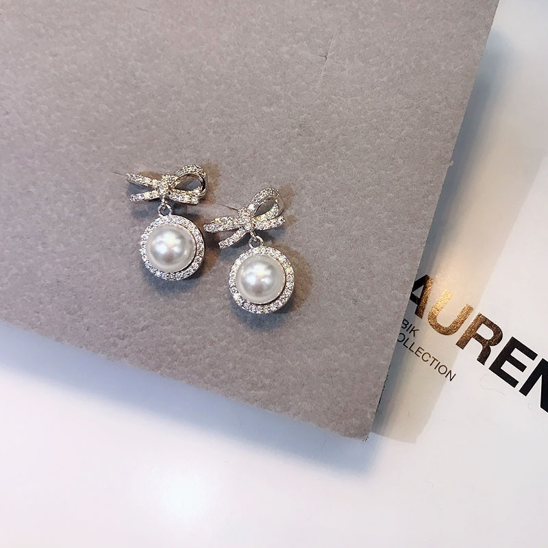 wholesale jewelry simple bow pearl alloy diamond earrings Nihaojewelrypicture2