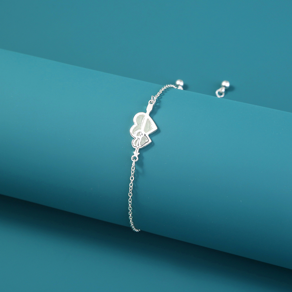 Bijoux de mode simples une flche  travers llment de coeur bijoux de bracelet lumineux lumineux bleu vertpicture6