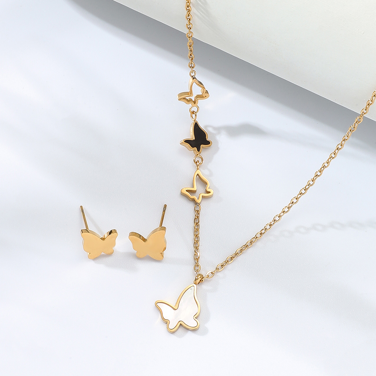 EdelstahlGalvanik 18 Karat Gold klebrige Muschel Schmetterling Halskette Ohrringe Setpicture1